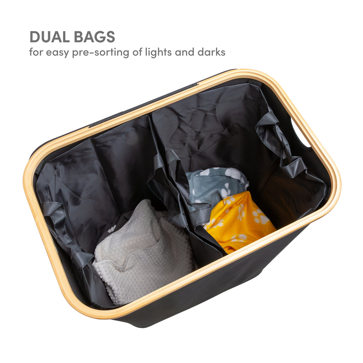 Two-section black laundry hamper for sorting lights and darks