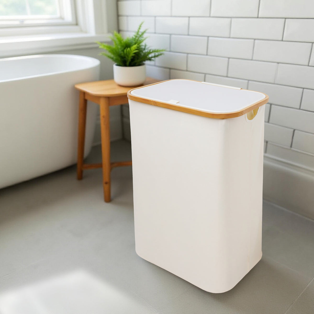 Cream large laundry hamper with lid in bright bathroom
