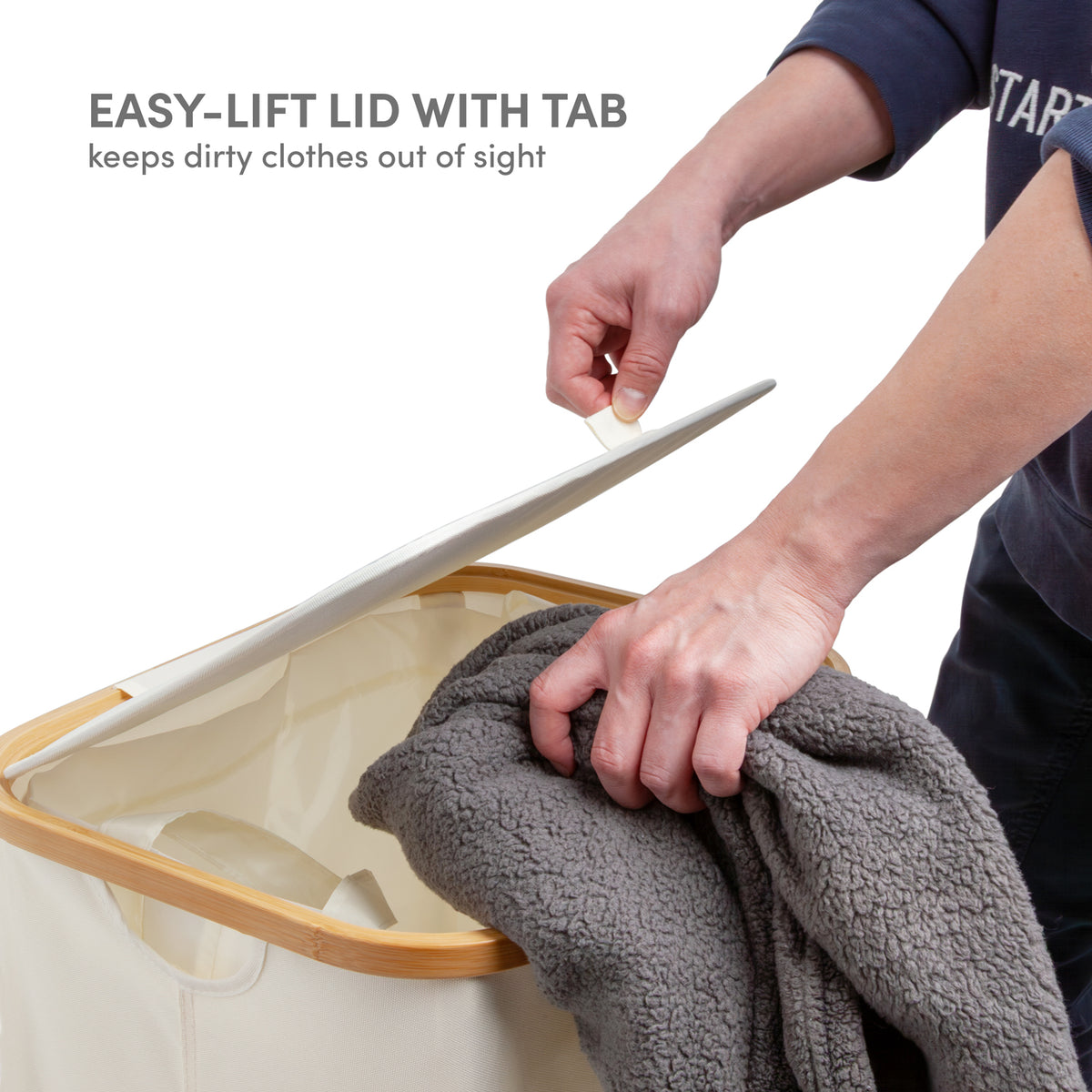 Easy-lift lid with pull tab on cream laundry hamper