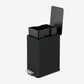 Removable inner bucket inside small black trash can