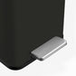 Stainless steel hands-free pedal on black slim trash can