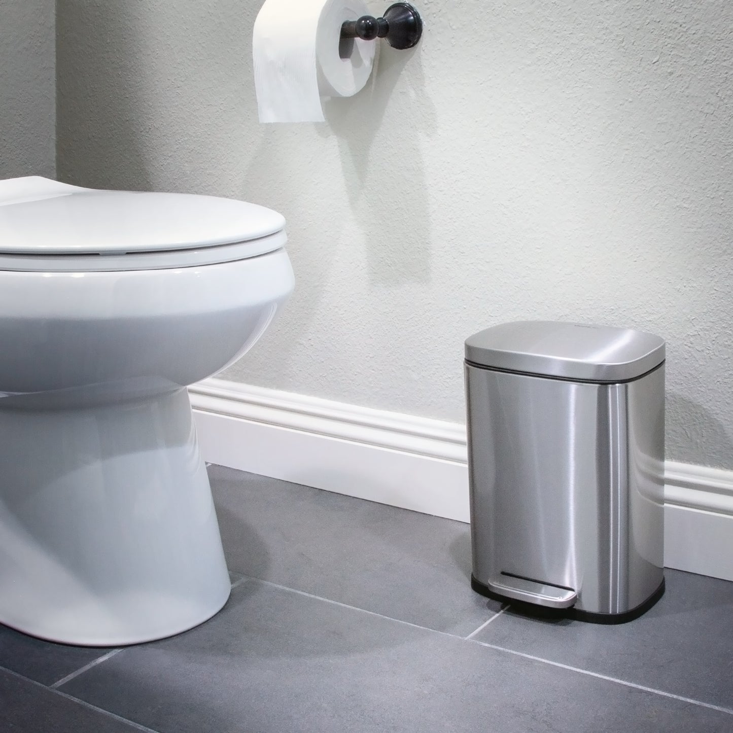 Compact stainless steel step trash can for bedroom or bathroom