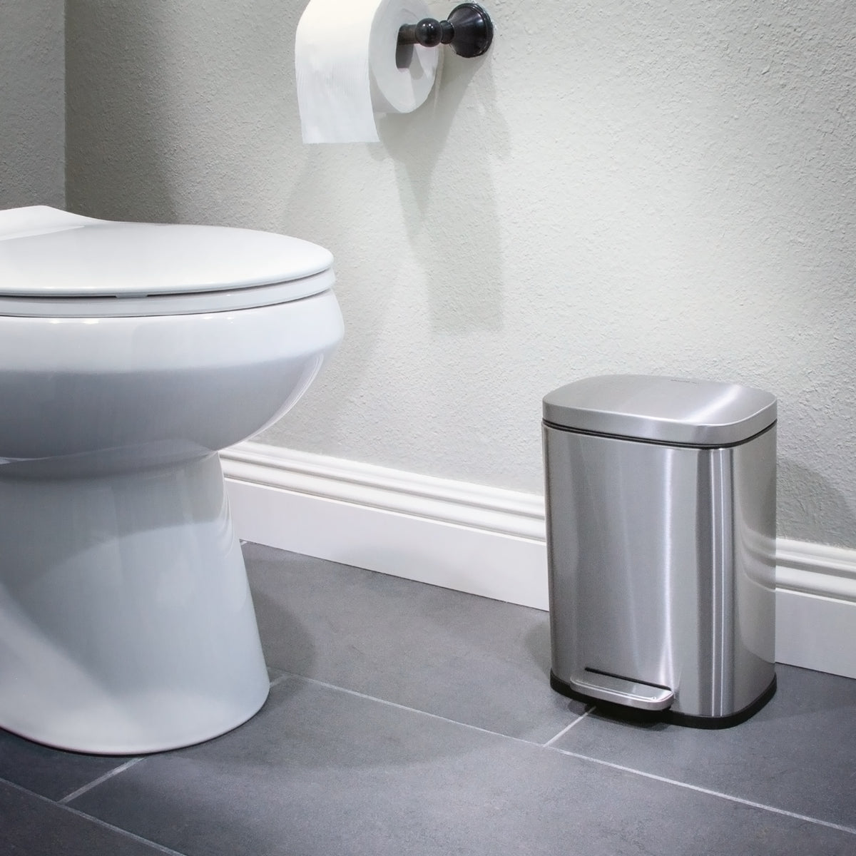 Compact stainless steel step trash can for bedroom or bathroom
